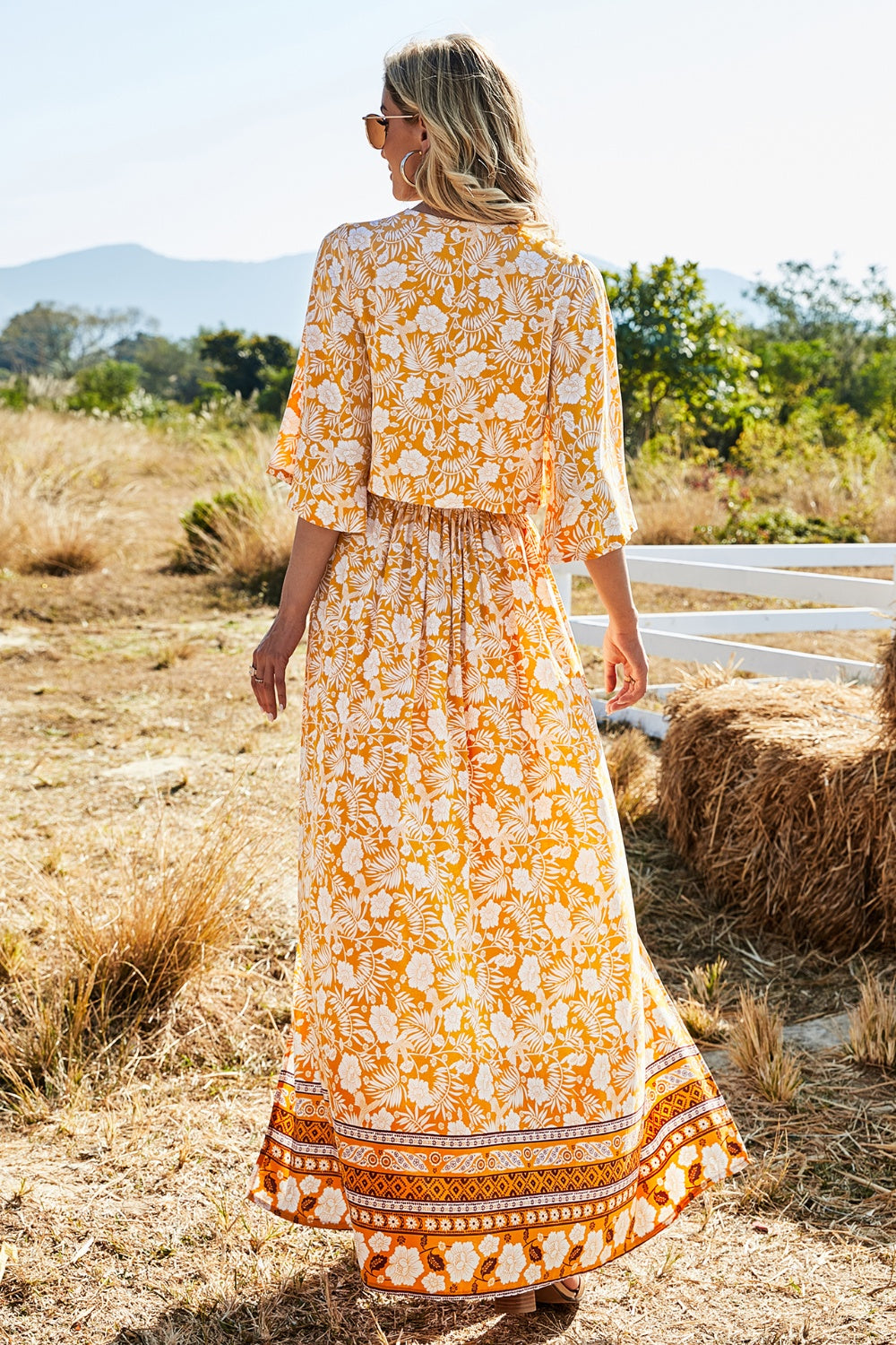 Aquiline Printed Half Sleeve Top and Slit Skirt Set